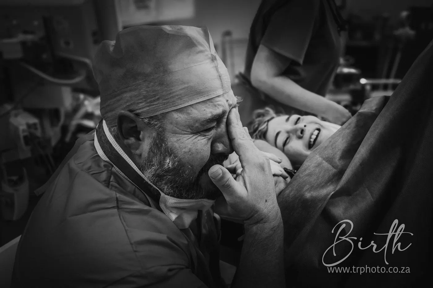 A father in tears as he meets his baby